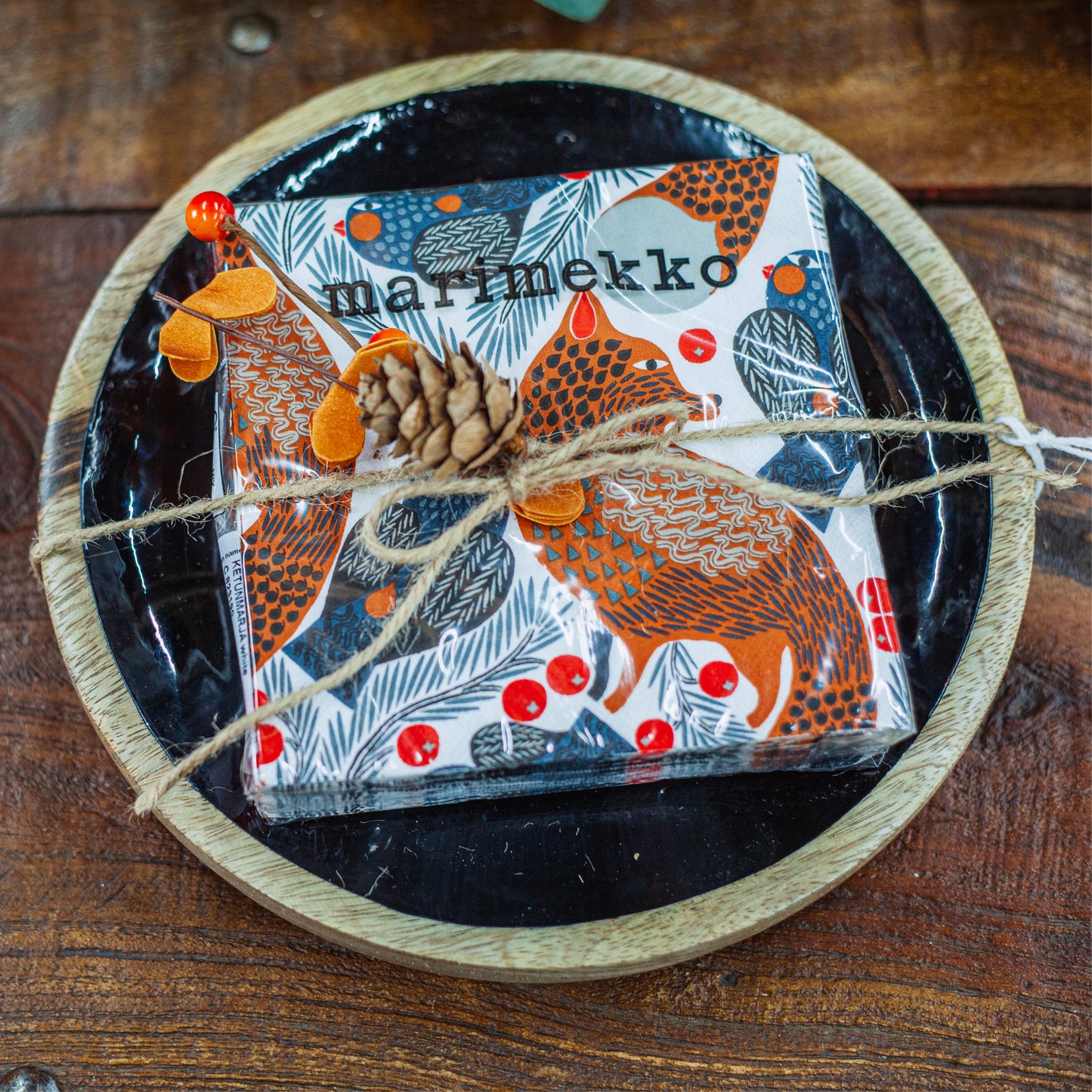 Small wood plate with black enamel interior and fox cocktail napkins